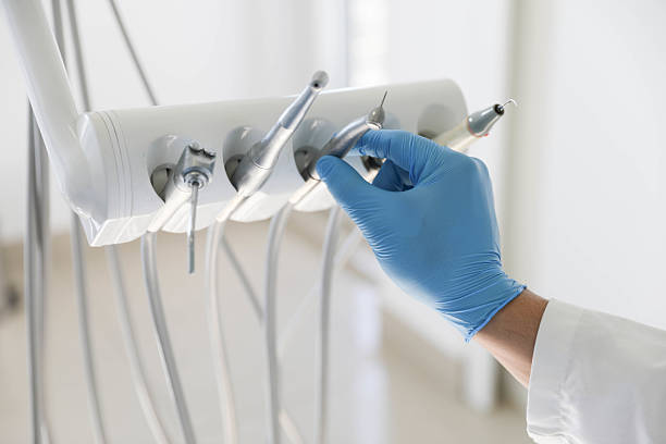 Professional Tooth Extraction technician working in New Berlin, IL
